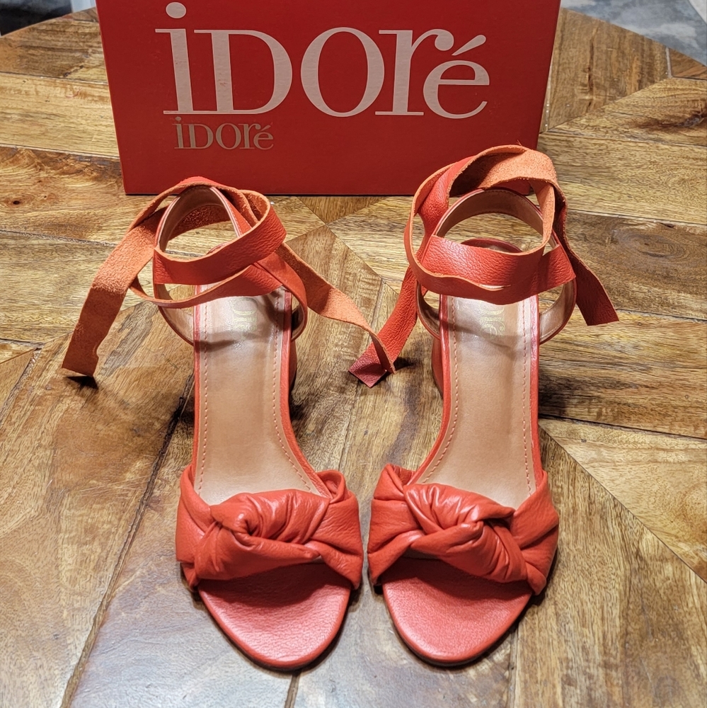 iDoré: Burnt orange, block heeled, wrap around sandals with knot detailing. 8W